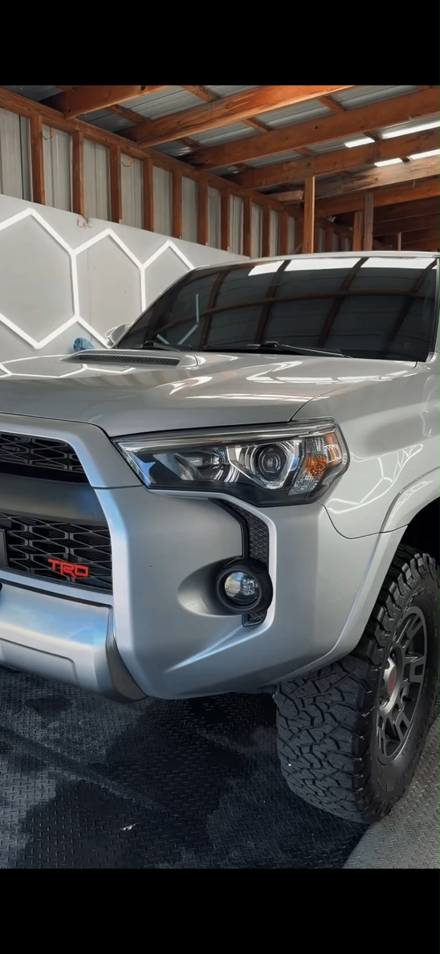 Silver Toyota 4Runner front end polished